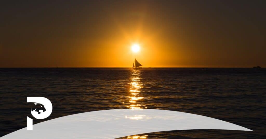 a sailboat approaches the horizon